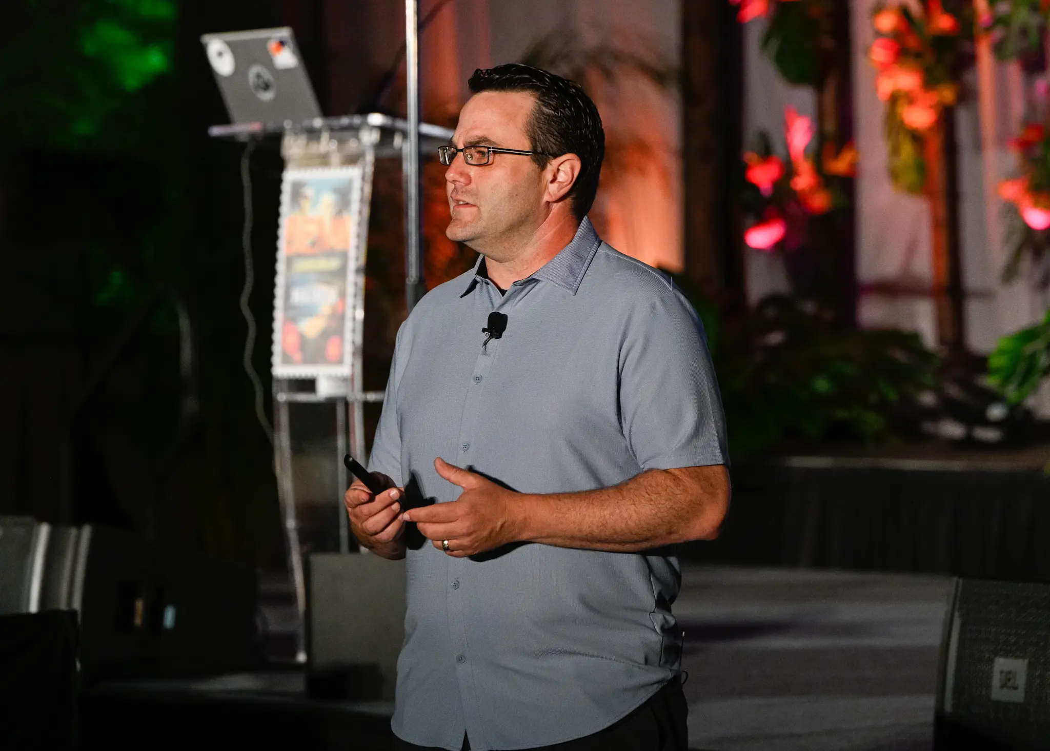 Jon Lakefish speaking live at an industry conference